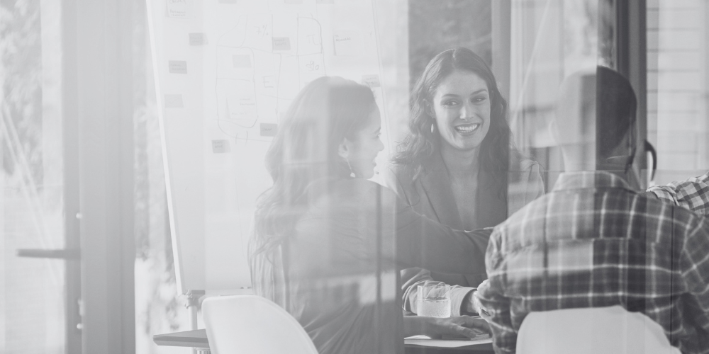 A group of 5 people in an informal meeting
